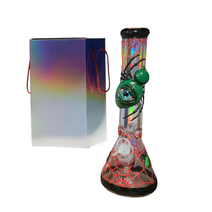Colourful glass smoking bong with spider web design and gift box on a white background