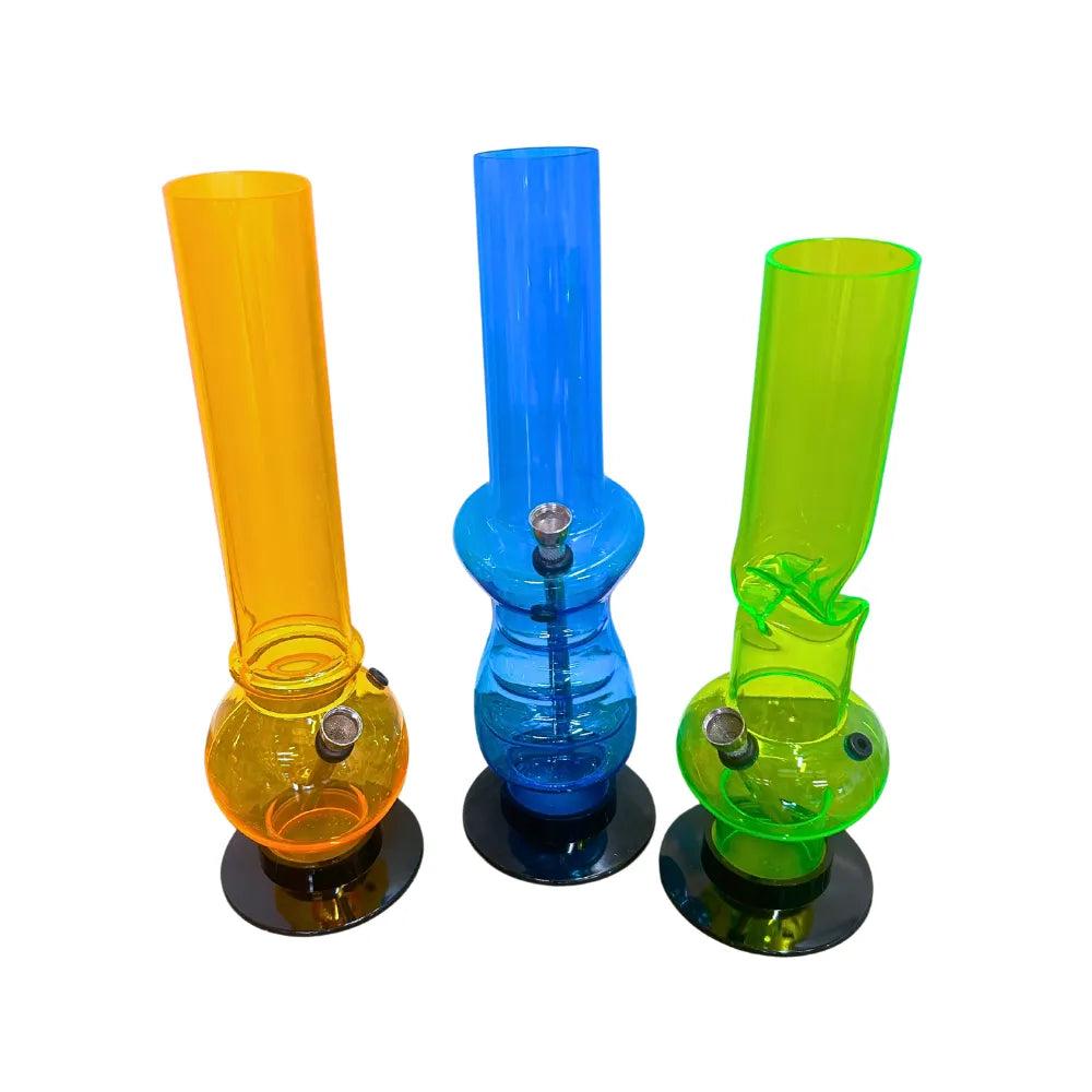 Three colorful acrylic smoking devices on a white background