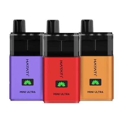 Three Hayati Mini Ultra vape devices in purple, red, and orange on a white background.
