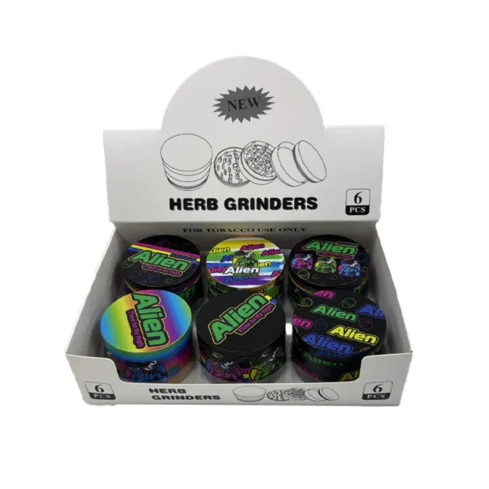 Box of 6 Alien Herb Grinders with colourful grinders inside on a white background