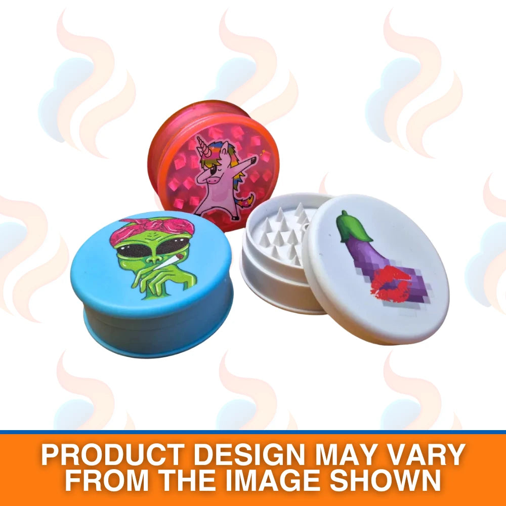 Three colourful Magic Leaf "Print Collection" plastic grinders with alien, unicorn, and lipstick designs on a white background.