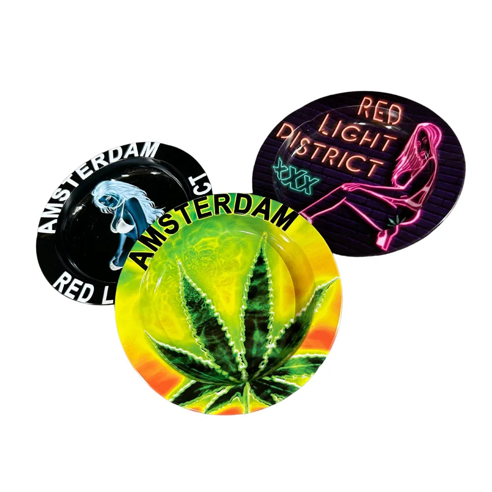 three colourful metal ashtrays with Amsterdam inspired designs on a white background