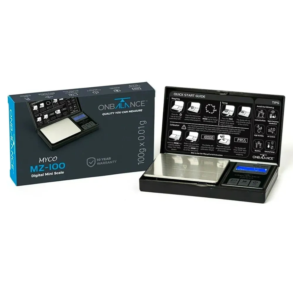 ONB MZ100 Digital mini scale with open packaging showing scale and user guide on a white background