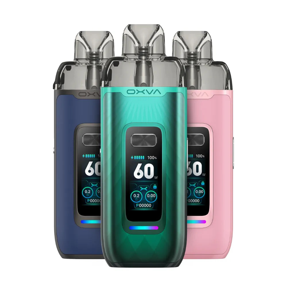 Three OXVA VPRIME vaping devices in blue, green, and pink on a white background
