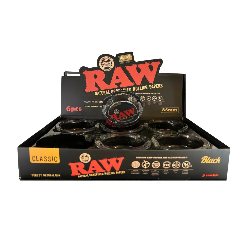 Box of Raw glass ashtrays with visible branding on a white background