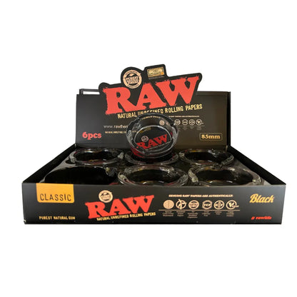 Box of Raw glass ashtrays with visible branding on a white background