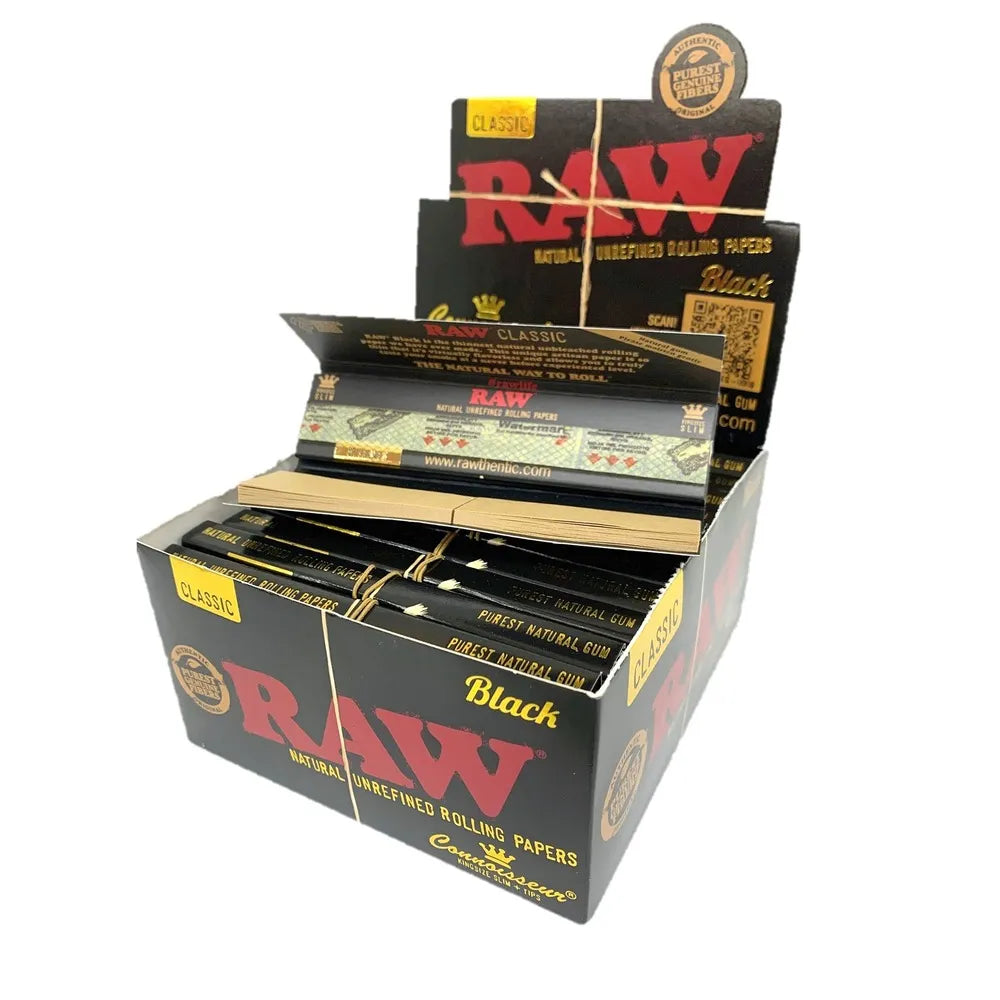 Display box of 24 RAW Black rolling papers with visible branding.