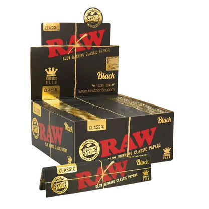 Box of 50 Raw Black rolling papers with gold accents on a white background