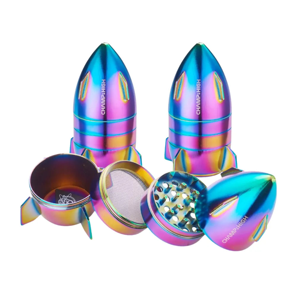 Colourful rocket-shaped grinder with open compartments on a white background