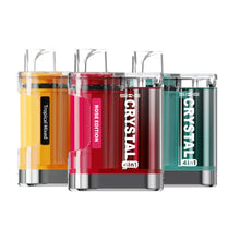 Three colorful vape devices with 'CRYSTAL' branding on a white background