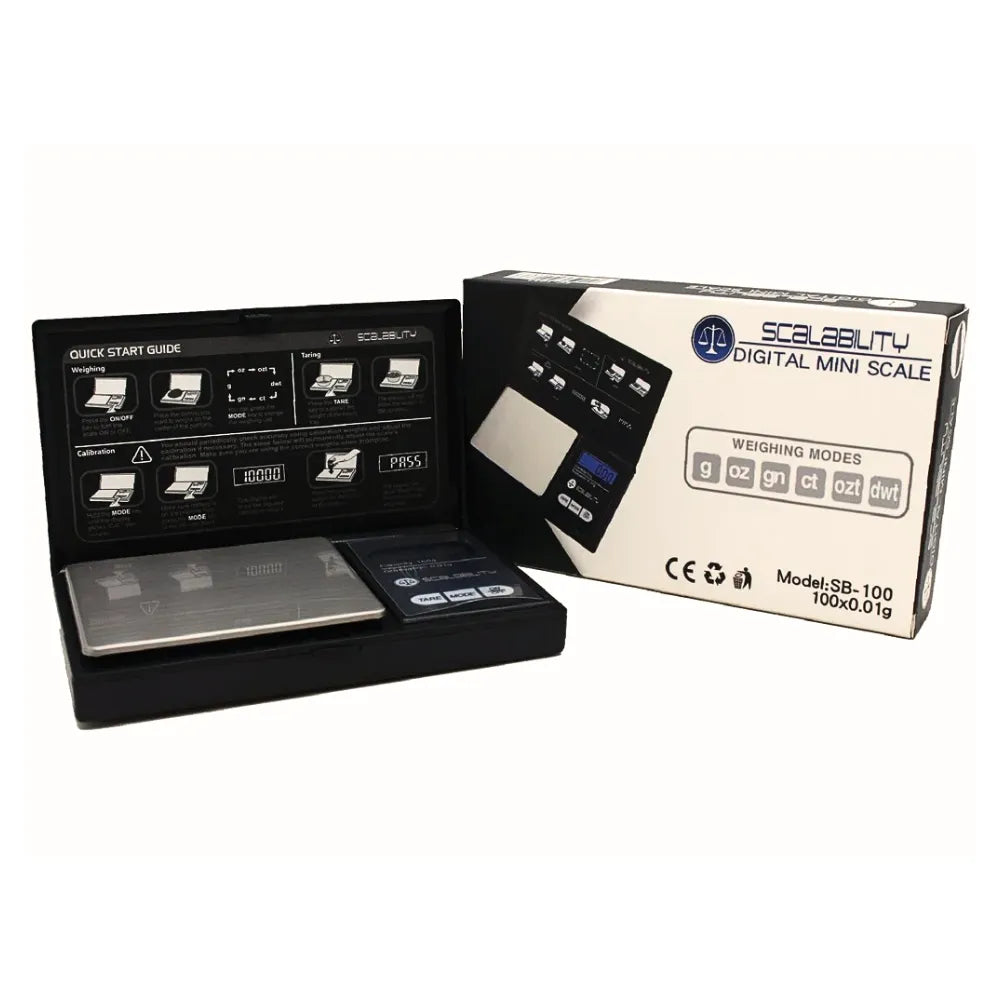 Digital mini scale with packaging on a white background