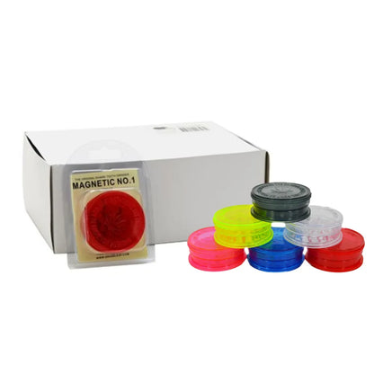 Set of colourful magnetic plastic grinders with a box labelled 'Magnetic No.1' on a white background