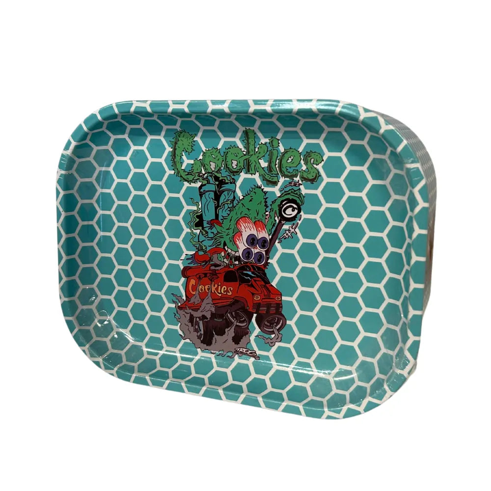 Teal storage tin with 'Cookies' branding and graphics on a white background