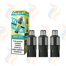 Three black and translucent gray Suonon Pro X vape refill pods shown next to their green and white retail packaging box on a white background with light blue and pink flame graphics.