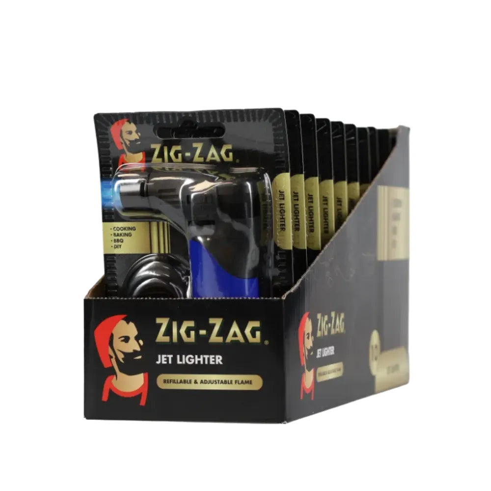 Display box of 10 Zig-Zag jet lighters with a black and gold design.