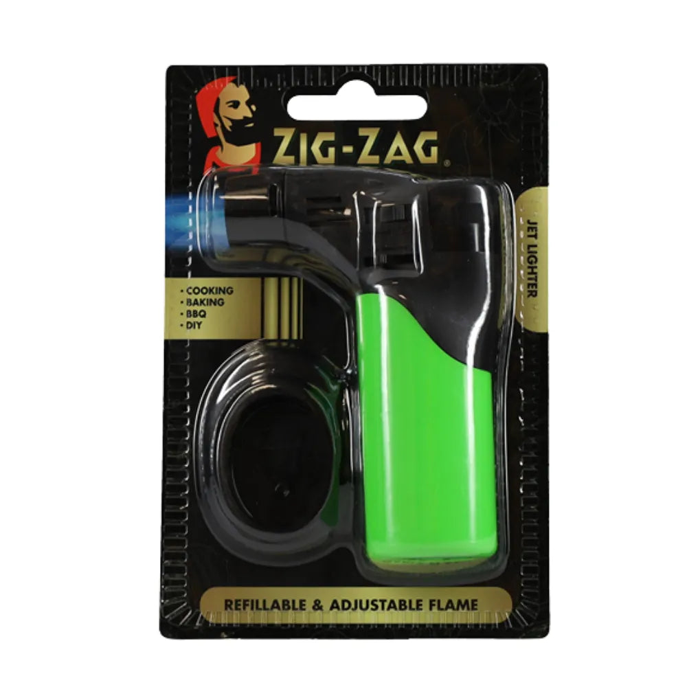 Zig-Zag jet lighter in packaging with green body and black accents.
